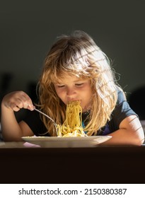 Tasty Food, Messy Child Eating Spaghetti. Cute Child Eating Breakfast At Home. Kid Boy Eating Healthy Food At Home.
