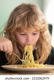 Tasty Food, Messy Child Eating Spaghetti. Child Have A Breakfast. Tasty Kids Breakfast. Childcare And Childhood. Close Up Portrait Of Funny Kid Eating Noodles Pasta.