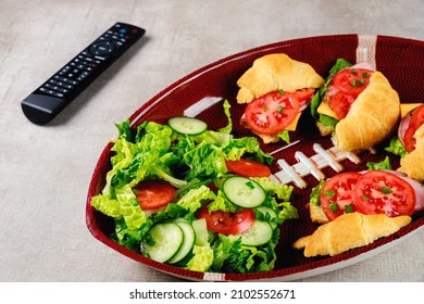 Tasty Food On The Plate With Tv Remote Controller For The Football Party.