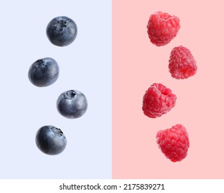 Tasty fresh ripe blueberries and raspberries on color background