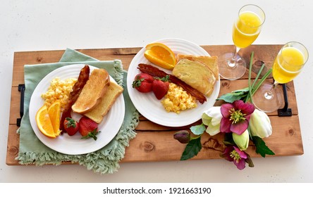 Tasty Gourmet Classic American Breakfast Room Service With Bacon, Eggs, Toast, Fruit, Mimosa. Top View, Photo Concept, Background, Copy Space