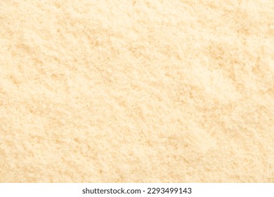 Tasty grated Parmesan cheese as background, closeup - Shutterstock ID 2293499143