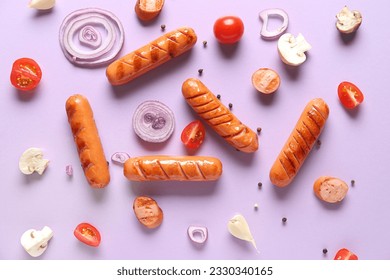 Tasty grilled sausages and vegetables on lilac background