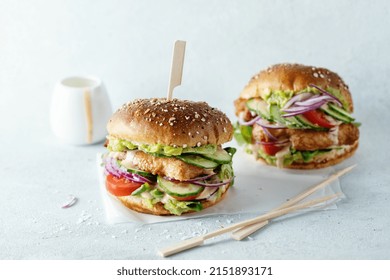 Tasty Healthy Burger With Chicken Breast And Vegetables On Bright Background.  Healthy Eating Concept