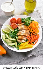 Tasty healthy vegetable salad with roasted chicken breast. Dish for dinner