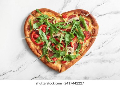 Tasty heart shaped pizza with arugula on white background - Powered by Shutterstock