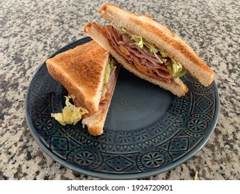 A Tasty Homemade Bacon, Ham Sandwich With Honey Mustard. 