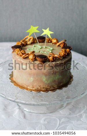 Tasty homemade cake decorated by stars. Twenty three