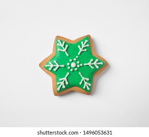 Tasty homemade Christmas cookie on white background, top view