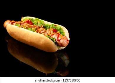 Tasty Hot Dog With Reflection On Black Background