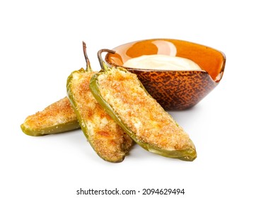 Tasty Jalapeno Poppers And Sauce On White Background