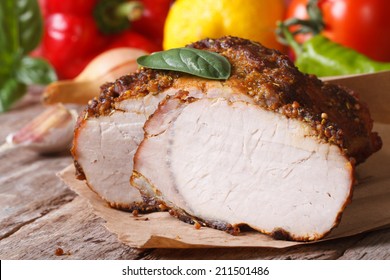 Tasty juicy roast pork tenderloin and fresh vegetables on an old table. horizontal  - Powered by Shutterstock