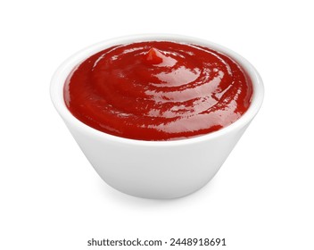 Tasty ketchup in bowl isolated on white. Tomato sauce