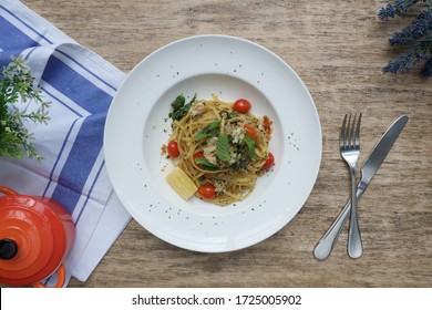 Tasty Linguine With Fresh Crab Meat, Chilli, Lemon And Mint On Wooden Table.