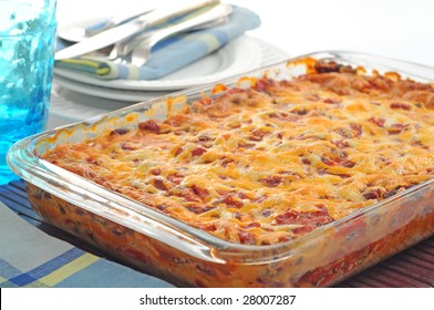 Tasty Mexican Style Casserole With Cheese And Salsa.