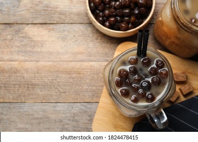 Tasty Milk Bubble Tea On Wooden Table, Flat Lay. Space For Text