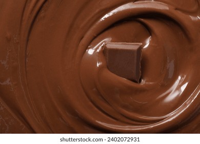 Tasty milk chocolate paste and piece as background, top view - Powered by Shutterstock