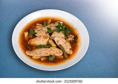 Tasty Noodle Soup With Vegetables In Bowl On The Desk