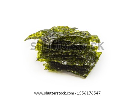 Tasty nori seaweed isolated on white. 