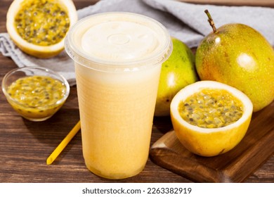 Tasty Passion Fruit Juice; Photo On Wooden Background
