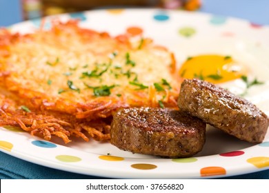 Tasty Patty Sausage  With Egg And Crispy Hash Browns