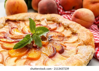 Tasty Peach Galette On Table, Closeup