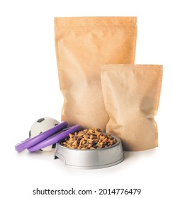 Tasty Pet Food And Toys On White Background