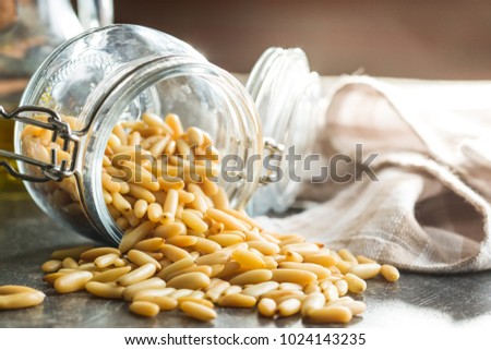 Tasty pine nuts in jar.