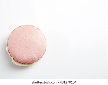 Tasty Pink Macaron Isolated On White