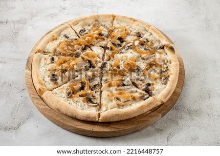 Tasty pizza with mushrooms and onion on the white cincrete background Stock photo © 