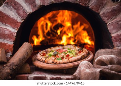 Tasty Pizza Out Of Oven In Restaurant Kitchen