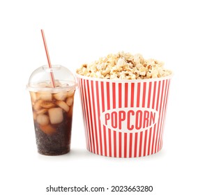 Tasty popcorn and cola on white background - Powered by Shutterstock