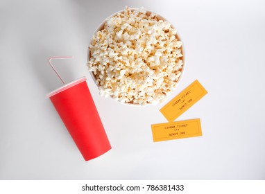 Tasty Popcorn, Cup With Drink And Movie Tickets On White Background, Top View