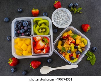 Tasty Raw Fruits In Plastic Lunch Box. Bento Box. Take Away Food. Vegetarian Food.