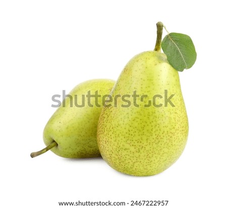 Tasty ripe pears with leaf on white background