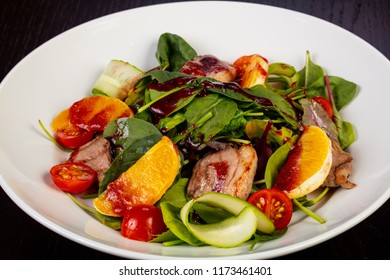Tasty salad with fried duck breast