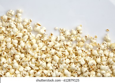 Tasty salted popcorn isolated on white background