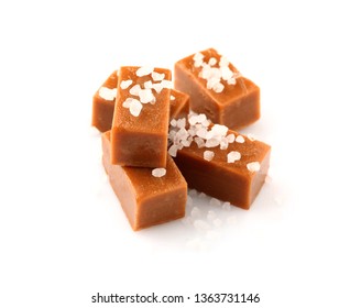 Tasty Salty Caramel Candies On White Background