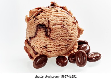 Tasty Scoop Of Gourmet Italian Creamy Coffee Ice Cream With Roasted Beans As Ingredients In The Foreground In A Close Up Top View Showing Texture Over White