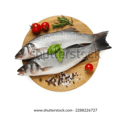 Tasty sea bass fish and ingredients isolated on white, top view