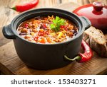 Tasty spicy chili con carne casserole in a pot for those winter nights, high angle view