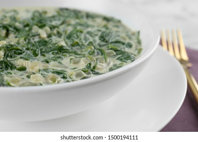 Tasty Spinach Dip In White Ceramic Bowl