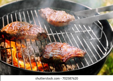 Tasty Steaks On Barbecue Grill, Close Up