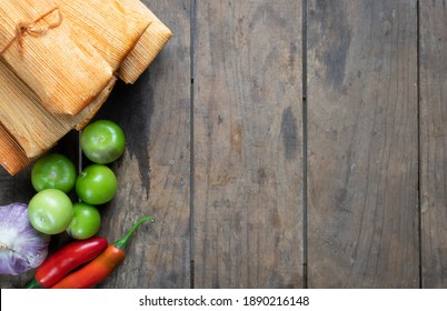 Tasty Tamales With Ingredients Of Preparation In An Overhead Shot