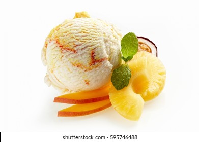 Tasty tropical fruit Italian artisanal ice cream or gelato with fresh mango, pineapple and granadilla garnished with mint - Powered by Shutterstock