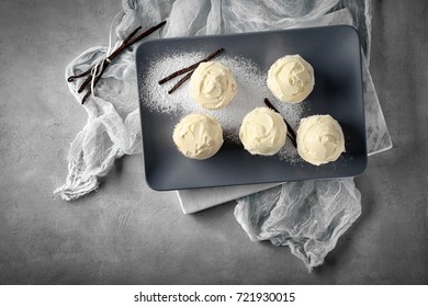 Tasty Vanilla Cupcakes On Plate