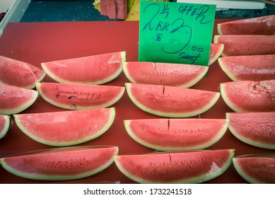 Tasty Watermelon Slice Cuts In Cling Film With Price Tags At Market Stand In Singapore. Summer Tropical Fruit In Plastic Wrap For Convenience To-go Take Away Healthy Snacks