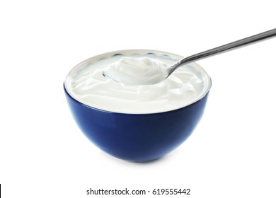 Tasty Yogurt In Bowl With Spoon On White Background