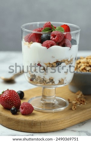 Similar – Chia-Joghurt mit Himbeeren im Glas auf Holz