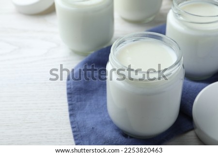 Similar – Image, Stock Photo glass jars with homemade yogurt